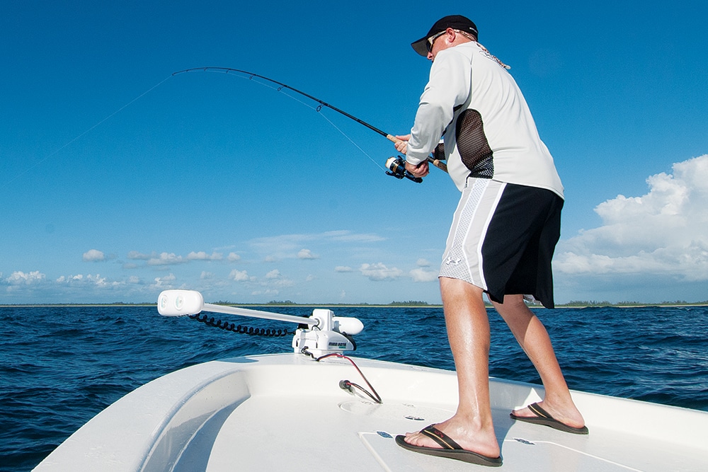 Angler fishing nearshore from bay boat