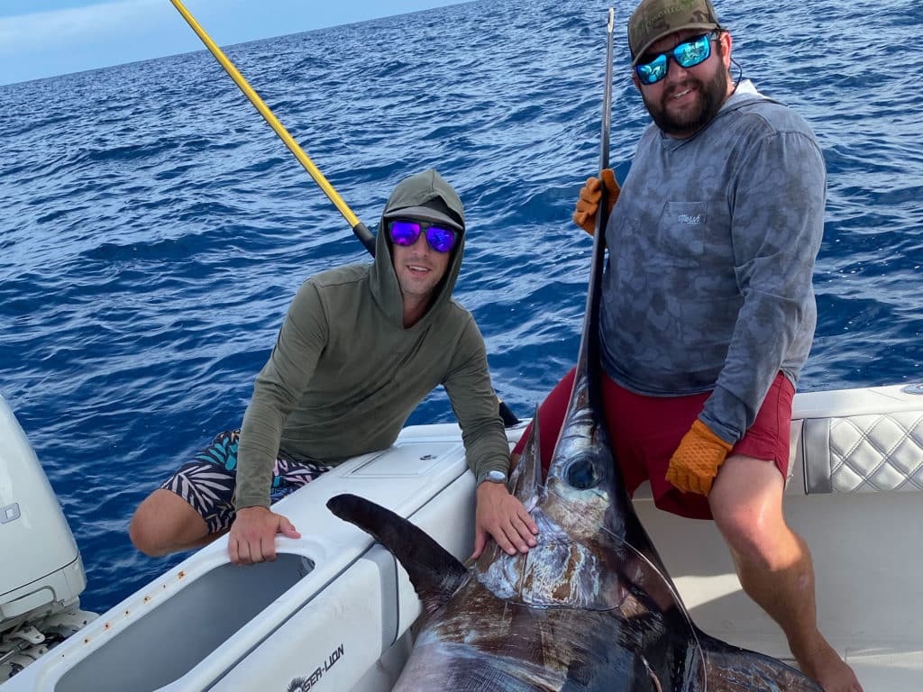 Huge swordfish in the boat